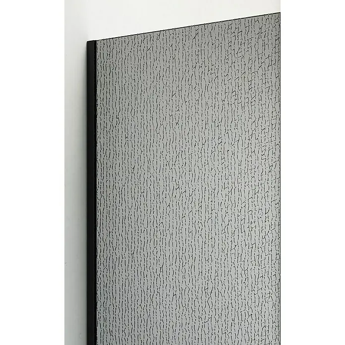 Camargue Vario Duschwand B65EG - B x H: 115 x 200 cm, Beschichtet, Grau/Schwarz - Nahaufnahme einer strukturierten, grauen Platte mit dunklem Rahmen, die ein einzigartiges Muster aufweist.