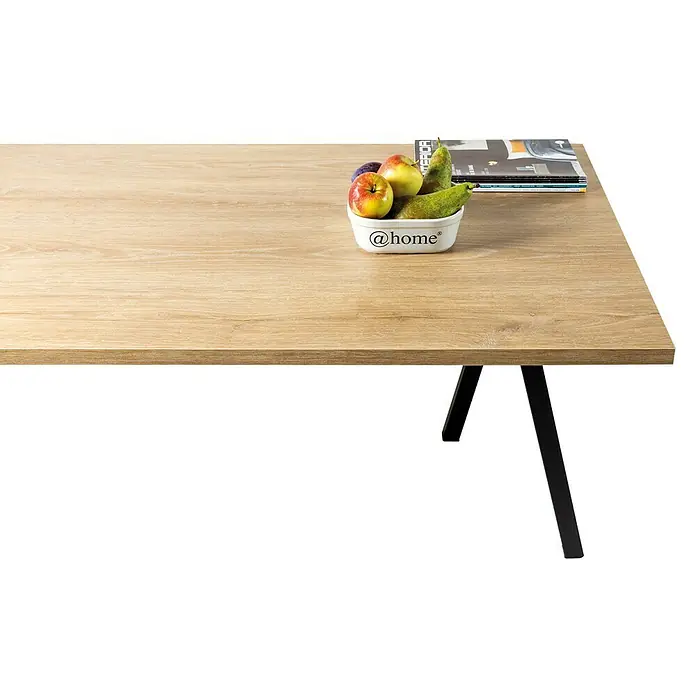 Tischplatte - Robinson Eiche, 80 cm x 80 cm x 25 mm - Moderner Esstisch aus hellem Holz mit schwarzem Metallgestell, dekoriert mit Obstschale und Magazinen.