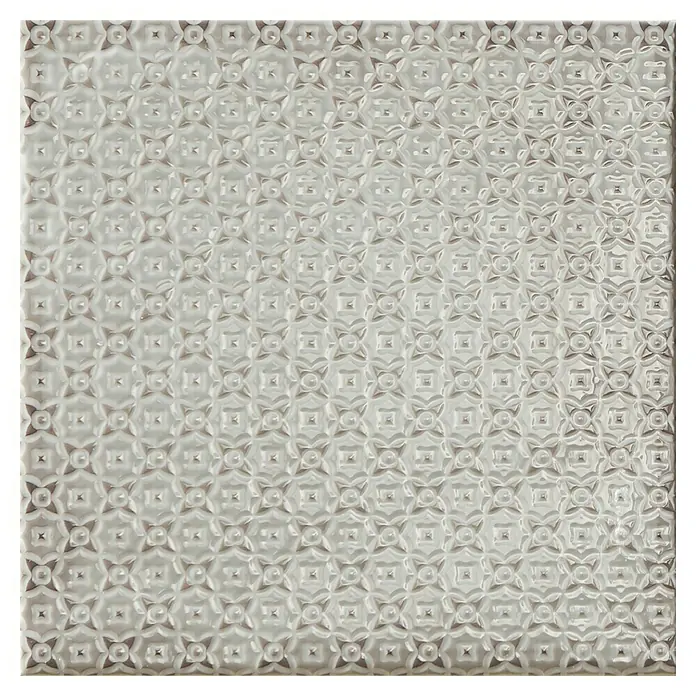 BHS Showroom Revestimiento de pared Rain Decor - 22,3 x 22,3 cm, Grigio, Brillante - Primer plano de una baldosa de pared blanca texturizada con un patrón geométrico repetitivo, ideal para baños o cocinas.