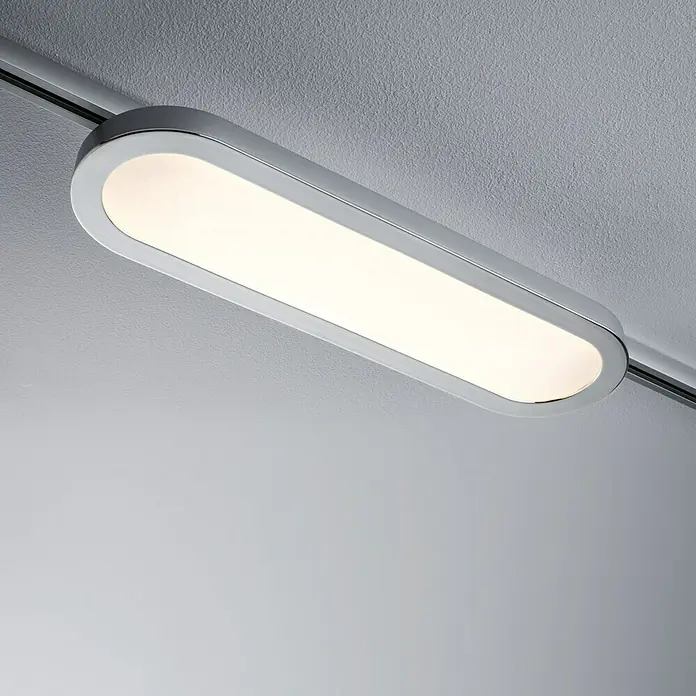 Paulmann URail LED-Panel Loop - 7 W, Chrom, L x B x H: 38 x 11 x 3,5 cm - Diese Nahaufnahme zeigt eine längliche Deckenleuchte mit Chromrahmen, die ein warmes, einladendes Licht in den Raum wirft.