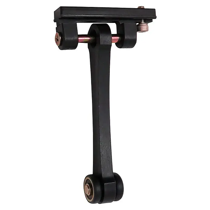 Micel Polea TLD21 - L x An x Al: 65 x 18,5 x 109 mm, Negro - Primer plano de un freno de bicicleta negro en forma de T con detalles en color bronce, destacando su construcción y funcionalidad.