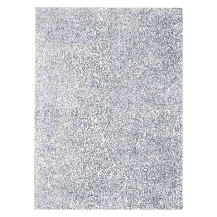 Kayoom Hochflorteppich Bali - Puderblau, 290 x 200 cm, 100 % Polyester - Detailaufnahme eines grauen Teppichs mit weicher Textur, ideal für ein gemütliches Ambiente. Perfekt, um jedem Raum Wärme und Komfort zu verleihen.