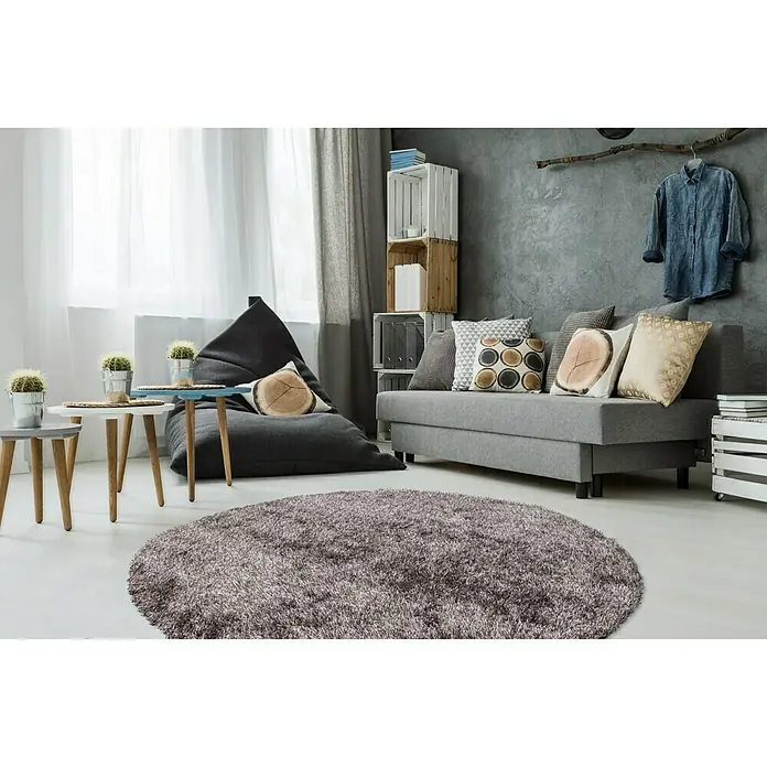 Kayoom Hochflorteppich Diamond - Champagner, Durchmesser: 160 cm, 100 % Polyester - Ein flauschiger, runder Teppich in einer stilvollen Wohnung. Der Teppich verleiht dem Raum Wärme und Komfort.