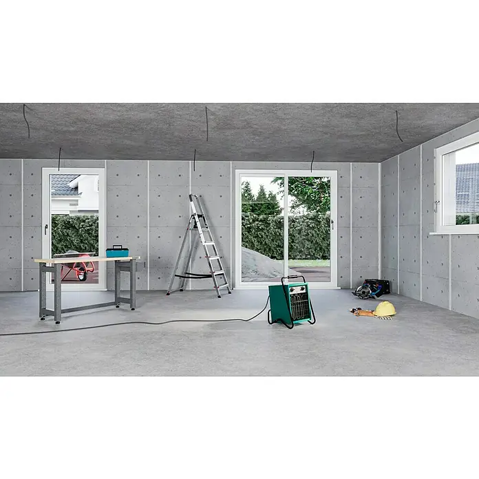 Voltomat HEATING Bauheizer - 4.500 W - 9.000 W, Nennspannung: 400 V, Grün/Schwarz, IP24 - Eine Werkstatt mit einer Werkbank, einer Leiter, einer Heizung und verschiedenen Werkzeugen, die eine produktive Atmosphäre ausstrahlen.