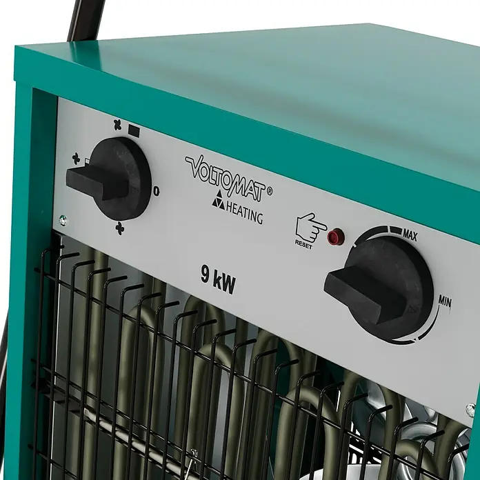Voltomat HEATING Bauheizer - 4.500 W - 9.000 W, Nennspannung: 400 V, Grün/Schwarz, IP24 - Detailansicht einer VOLTOMAT® 9kW Elektroheizung mit Bedienelementen und Schutzgitter.