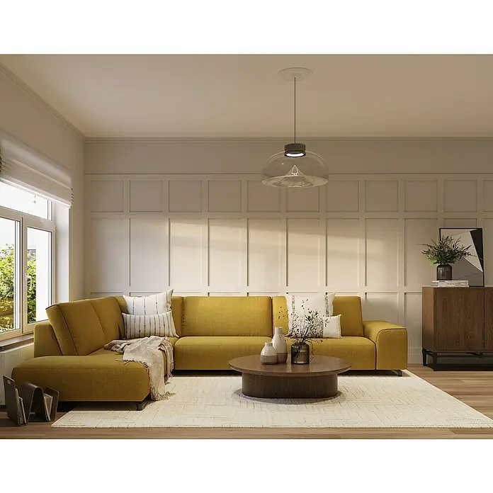 Nmc Decoflair Zierprofil Deckenleiste A2 - 2 m x 50 mm x 50 mm, Extrudiertes Polystyrol (XPS) - Gelbes Ecksofa mit Couchtisch auf hellem Teppich. Die Lampe hängt von der Decke und die Wand ist mit Paneelen verziert.