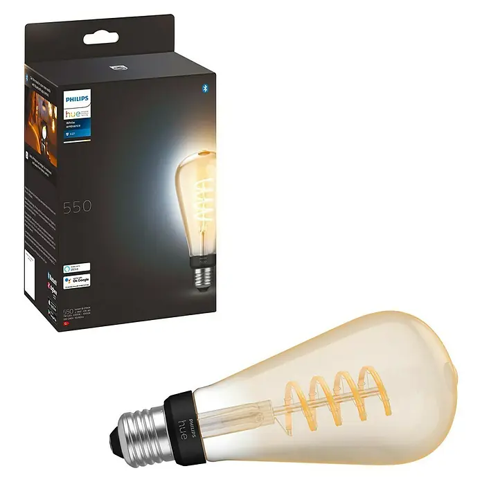 Philips Hue Smart-LED-Lampe White Ambiance Filament - E27, Dimmbar, Warmweiß, 550 lm, 7 W, Lampenbezeichnung: ST72, 1 Stk. - Eine Philips Hue White Ambiance Edison-Glühbirne und ihre Verpackung. Die Birne spendet warmweißes Licht und ist per App steuerbar.