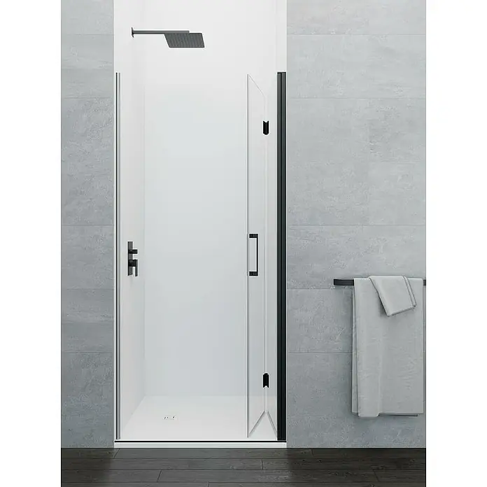 GME Mampara de ducha plegable Glass Combi 1 - 85 x 195 cm, Negro, Espesor de vidrio: 6 mm, An x Al: 85 (50/35) x 195 cm - Un baño moderno con una ducha a ras de suelo elegantemente separada por una mampara de ducha con detalles oscuros.