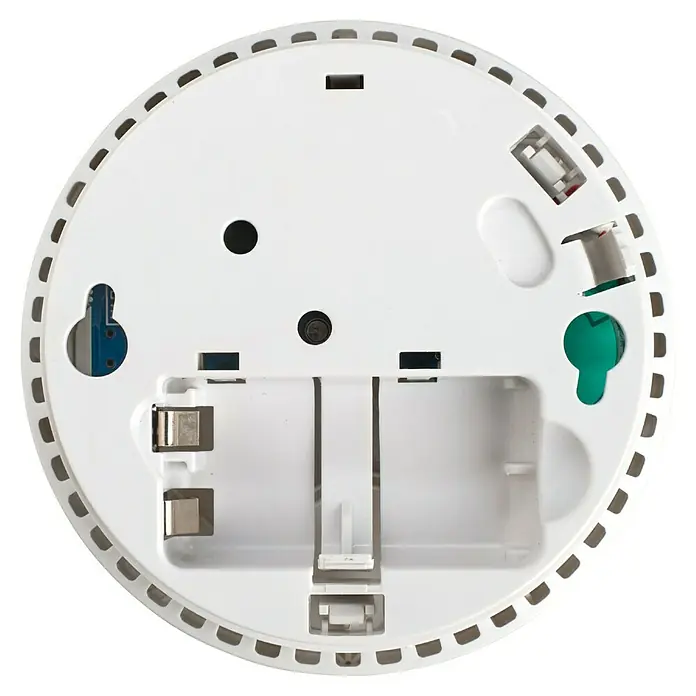 Gloria Rauchwarnmelder R-1 - Durchmesser: 100 mm, Batterielaufzeit: 2 Jahre, Alarmsignal: 85 dB - Nahaufnahme der Rückseite eines weißen Rauchmelders, der Details wie Batteriefach und Montagepunkte zeigt.