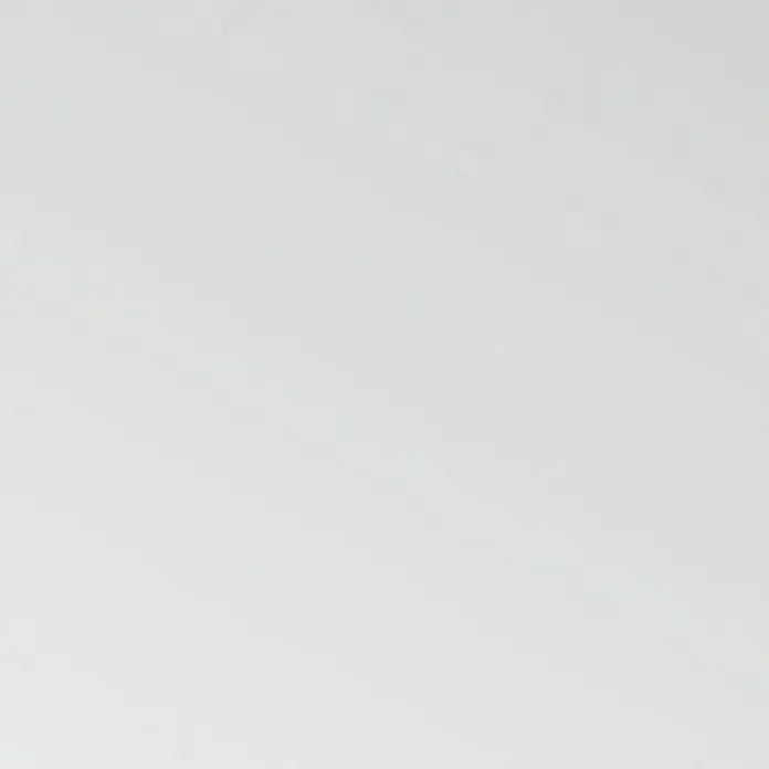 Knauf Sanitär-Silikon - Transparent, 300 ml - Eine minimalistische, matte, reinweiße Fläche, ideal als Hintergrund oder Textur für vielfältige Designprojekte.