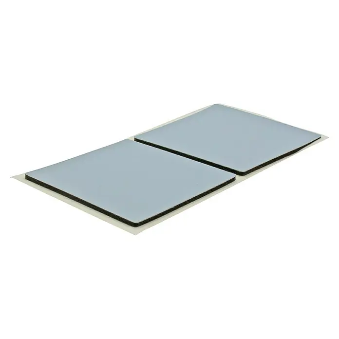 Wagner System Möbelgleiter - 45 x 45 mm, Kleben, 4 Stk. - Zwei quadratische, graue Anti-Vibrations-Pads mit schwarzem Schaumstoff und weißem Schutzpapier für Geräte oder Möbel.