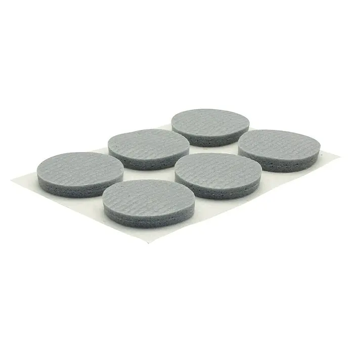 Wagner System Softpads - Ø x H: 22 x 4 mm, 12 Stk., Grau, Kleben - Eine Nahaufnahme von sechs runden, grauen Reinigungsschwämmen, die auf einem weißen Tuch angeordnet sind und eine leichte Textur aufweisen.