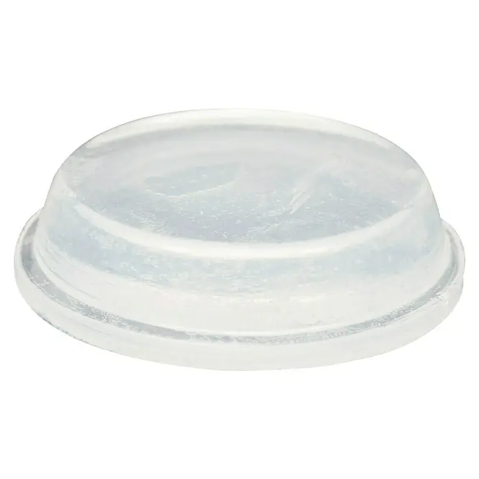 Wagner System Plastik-Gleiter - Transparent, Ø x H: 20 x 6,2 mm, 16 Stk. - Nahaufnahme eines transparenten Möbelknopfs aus Silikon, der als Türstopper oder Puffer verwendet wird, um Schäden zu vermeiden.