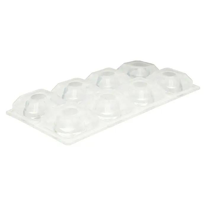 Wagner System Plastik-Gleiter - 15 x 15 mm, Transparent, 8 Stk. - Das Bild zeigt eine transparente Silikonform für Eiswürfel oder Pralinen mit acht Mulden in Halbkugelform auf schwarzem Hintergrund.