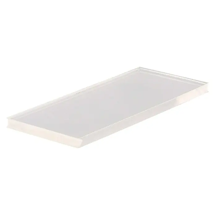 Wagner System Plastik-Gleiter - L x B x H: 50 x 20 x 6,4 mm, Transparent, 4 Stk. - Nahaufnahme eines rechteckigen, durchscheinenden Quaderblocks mit klaren Linien, ideal für moderne Architekturvisualisierungen.