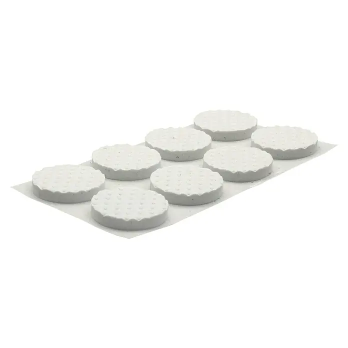 Wagner System Softpads - Ø x H: 19 x 3 mm, 16 Stk., Weiß, Kleben - Eine Nahaufnahme von 9 weißen, runden WC-Reinigungssteinen auf einer weißen Unterlage, die für Hygiene und Sauberkeit im Badezimmer sorgen.