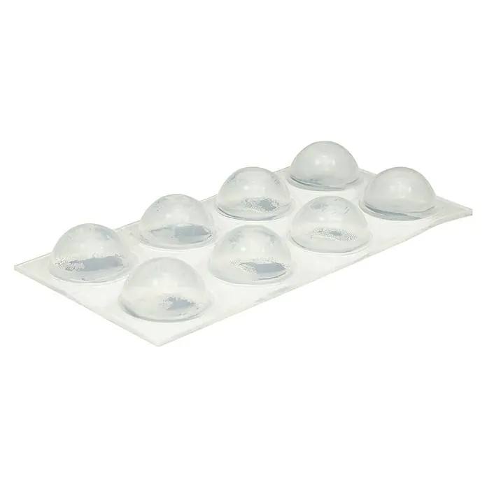 Wagner System Möbelgleiter - Durchmesser: 15 mm - Ein Tablett mit 9 einzelnen Dosen von Feuchtigkeitskapseln, die in einer durchsichtigen, halbkugelförmigen Form verpackt sind.