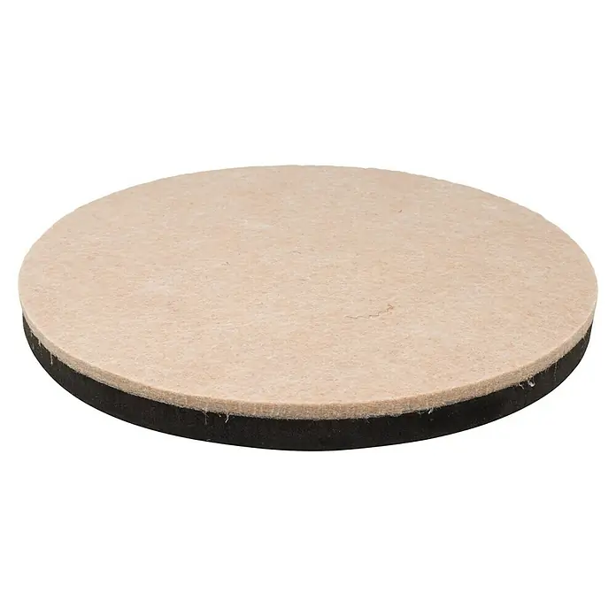 Wagner System Topfuntersetzer - Ø x H: 178 x 15 mm, 1 Stk., Natur/Schwarz - Nahaufnahme eines runden Möbelgleiters mit Filzgleitfläche und schwarzer Unterseite. Ideal zum Schutz von Böden vor Kratzern.