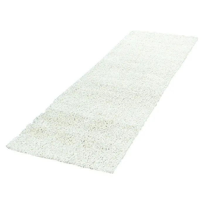 Hochflorteppich Life 1500 - Cream, 110 x 60 cm, 100% Polypropylen - Ein rechteckiger, weißer Teppich mit dichtem Flor, der auf einem schwarzen Hintergrund liegt. Er sorgt für Komfort und Wärme in jedem Raum.