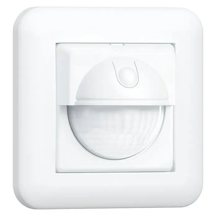 Steinel Bewegungsmelder IR 180 UP easy weiß - Reichweite Sensor: 8 m, Weiß, Erfassungswinkel Sensor: 180 °, L x B x H: 8,1 x 8,1 x 5,7 cm - Eine Nahaufnahme eines weißen Bewegungsmelders mit abgerundeten Ecken, eingebaut in eine Wand.