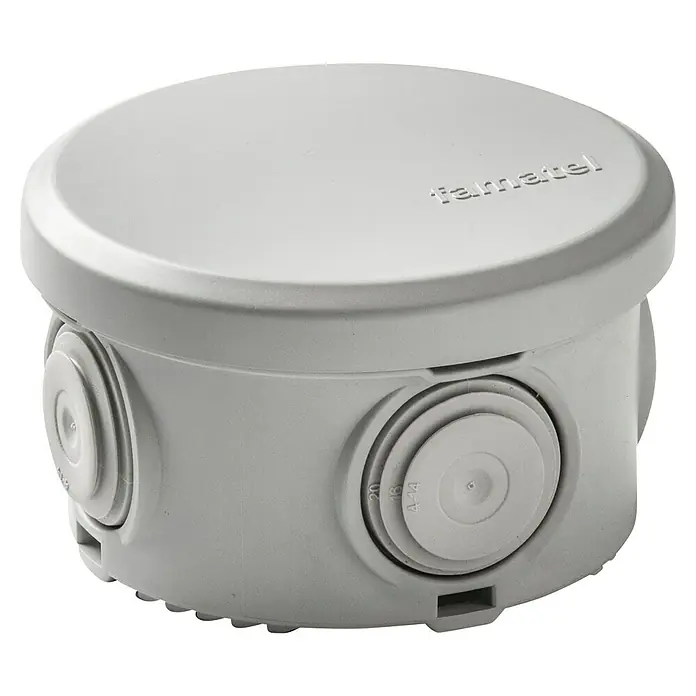 Famatel Caja de superficie estanca AcquaBOX - 5 x 8,4 x 8,4 cm, Gris - Una caja de conexiones redonda y gris con múltiples salidas, diseñada para instalaciones eléctricas exteriores.