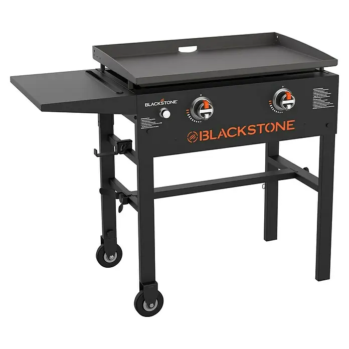 Blackstone Plancha-Grill 28" - Grillfläche (B x T): 73 x 45 cm, 10 kW, Anzahl Brenner: 2 Stk. - Abbildung eines Blackstone-Grills mit zwei Brennern, einer Seitentischplatte und Rollen für den einfachen Transport.