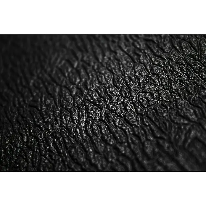 Coba Anti-Ermüdungsmatte Orthomat®-Standard - Breite: 90 cm, Schwarz - Nahaufnahme einer schwarzen, lederartigen Textur, die eine robuste und dennoch elegante Oberfläche zeigt. Ideal für hochwertige Produkte.