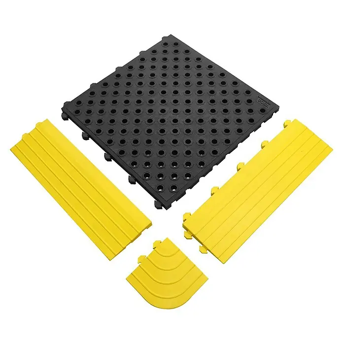 Coba Seitenelement Fatigue Lock Premium M - Gelb, Passend für: Fatigue Lock 28977434 / 28977160 / 28977188 - Bild von einem schwarzen, gelochten Bodenelement und gelben Randelementen für eine sichere Bodenmarkierung.