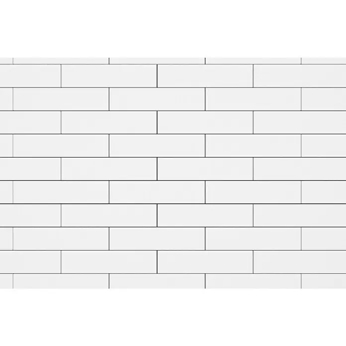 Modern Style Wandfliese Urban Blanco - 7,5 x 30 cm, Weiß, Matt - Das Bild zeigt eine Nahaufnahme einer Wand mit weißen, rechteckigen Fliesen, die versetzt angeordnet sind und ein modernes, sauberes Muster bilden.