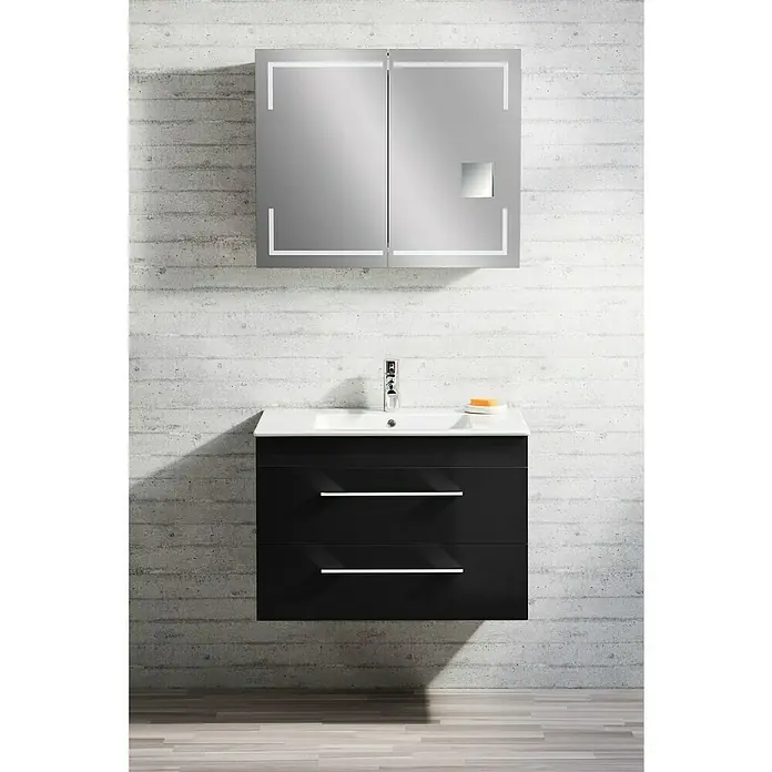 Lanzet K5 Waschtischunterschrank - 87,9 x 50,3 x 57,5 cm, Grafit - Modernes Badezimmer-Waschbecken mit Unterschrank und beleuchtetem Spiegelschrank vor einer Betonwand.