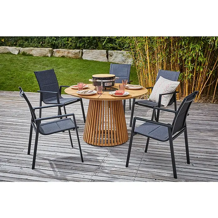 Kingstone Holzkohlegrill Kamado Tischgrill - Durchmesser Grillfläche: 29,5 cm, Schwarz - Ein runder Gartentisch mit Grill in der Mitte, umgeben von vier modernen Stühlen.