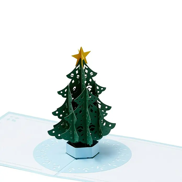 Cricut Maker Schneideplotter Maker 3 - Blau, Bluetooth, Schnittbreite: 29,7 cm, Schnittlänge: 3,6 m - Grüner 3D-Weihnachtsbaum aus Papier mit gelbem Stern auf einer blauen Papierbasis, ideal als festliche Dekoration oder einzigartige Grußkarte.