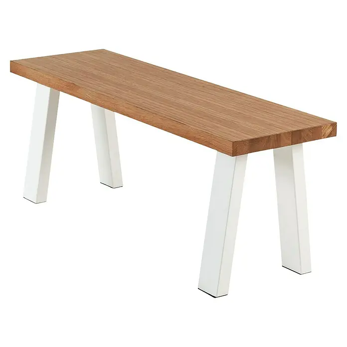 Pur Iternal Select Bankplatte - 110 x 35 x 4 cm, Eiche - Eine moderne Holzbank mit weißen Metallbeinen. Die Bank zeichnet sich durch ihr minimalistisches Design und die Kombination aus Holz und Metall aus.
