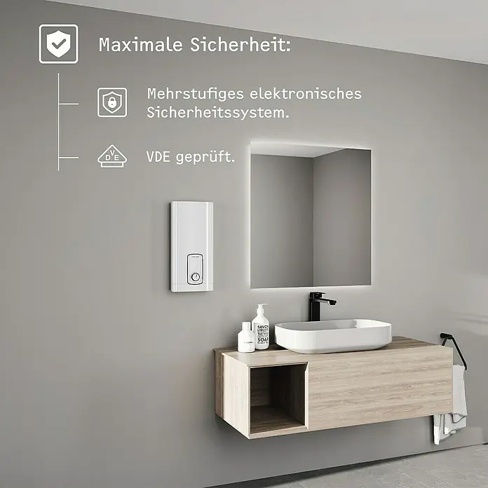 Stiebel Eltron Durchlauferhitzer DHB 18/21/24 ST Trend - 18/21/24 kW, Elektronisch, Druckfest - Elegantes Badezimmer mit einem elektronischen Wassererhitzer an der Wand, der maximale Sicherheit und VDE-Prüfung bietet.