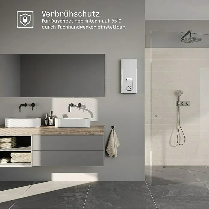 Stiebel Eltron Durchlauferhitzer DHB 18/21/24 ST Trend - 18/21/24 kW, Elektronisch, Druckfest - Produktansicht eines modernen Badezimmers mit einem elektronischen Durchlauferhitzer an der Wand.