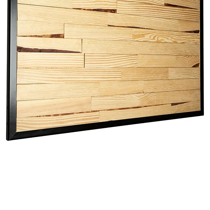 Kornik Holzschiebetür Industrial Eko - 93 x 206 cm, Kiefer - Nahaufnahme einer Wandpaneele aus Holz mit einem schwarzen Rahmen, die eine rustikale und moderne Ästhetik vereint.