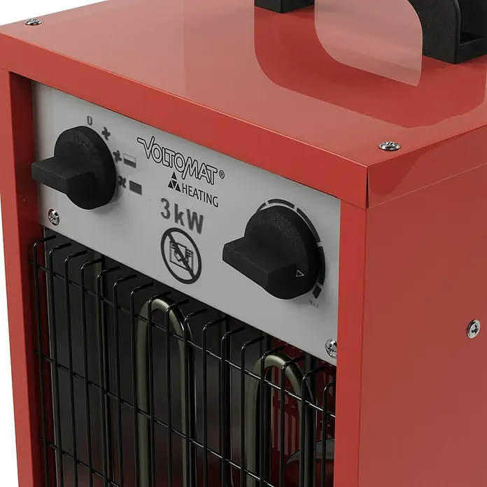 Voltomat HEATING Bauheizer - Passend für: Raumgröße bis ca. 25 m², 1.000 W - 3.000 W, Nennspannung: 220 V - 240 V, Rot, IP24 - Nahaufnahme einer roten VOLTOMAT HEATING 3kW Heizung mit Drehknöpfen und Gitter.
