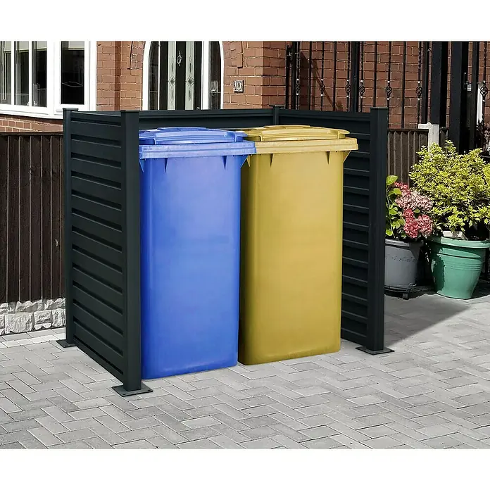 Floraworld Mülltonnenverkleidung - Aluminium, Anthrazit, Geeignet für Anzahl Mülltonnen: 2 Stk. - Eine Mülltonnenbox in Anthrazit mit zwei Mülltonnen in Blau und Gelb vor einem Haus.