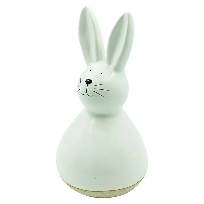 Dekofigur Hase - L x B x H: 9,5 x 9 x 17 cm, Weiß, Keramik - Eine weiße Keramik-Hasenfigur mit langen Ohren und einem niedlichen Gesicht vor schwarzem Hintergrund.