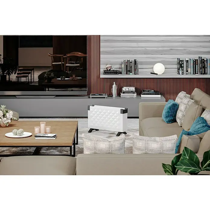 Voltomat HEATING Convector Rombo mini - 2.000 W, Habitaciones de hasta 25 m², Blanco/Negro - Elegante sala de estar con un moderno calefactor blanco, que proporciona una solución de calefacción elegante y eficiente.