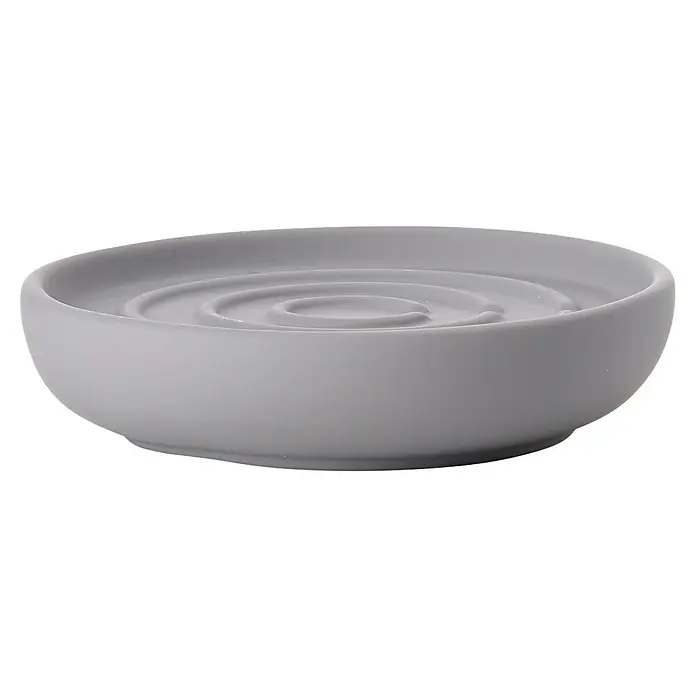 Zone Denmark Nova One Seifenschale - Porzellan, Gull Grey - Graue Keramik-Seifenschale mit spiralförmigem Design. Eine stilvolle Ergänzung für jedes Badezimmer, die Seife sauber und trocken hält.