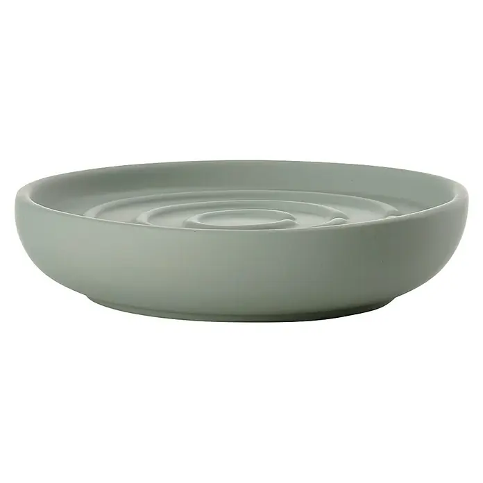 Zone Denmark Nova One Seifenschale - Porzellan, Matcha Green - Nahaufnahme einer grauen Schale mit einer spiralförmigen Vertiefung in der Mitte, ideal für stilvolle Tischdekorationen.