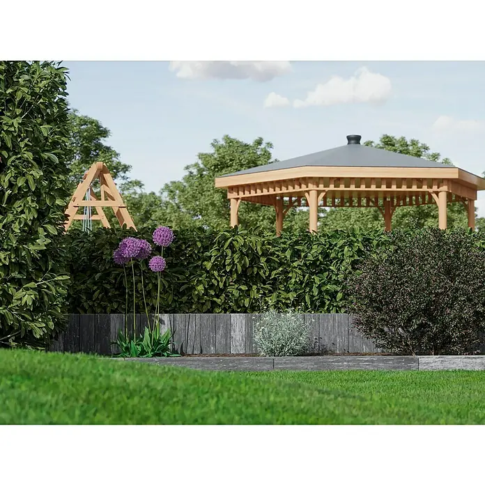 Diephaus Palisade / Mauerstein Laredo - 40 x 10 x 10 cm, Weiß/Schwarz, Beton - Nahaufnahme eines Gartens mit üppigem Grün, violetten Zierlauchblüten und einem Holzpavillon im Hintergrund.