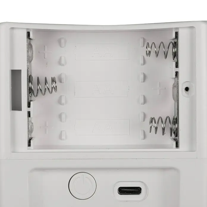Windhager Ratten- & Mäusebekämpfung Ultra Care - Nager, Akkubetrieben - Detailaufnahme eines Batteriefachs für drei AA-Batterien mit Pluszeichen und Federn für die Pole.