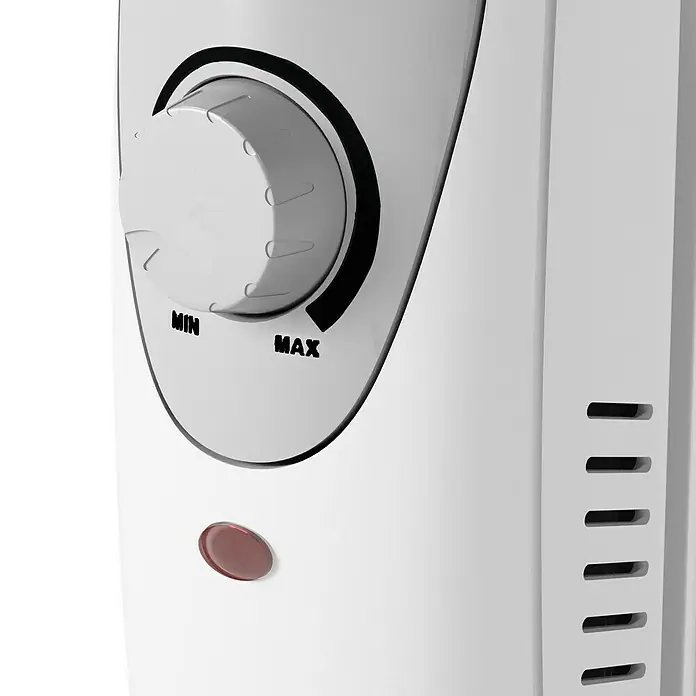 Voltomat HEATING Ölradiator Mini - 600 W, Raumgröße bis ca. 6 m², Weiß - Detailaufnahme eines Heizkörpers mit Regler auf Maximum und Betriebsanzeige.