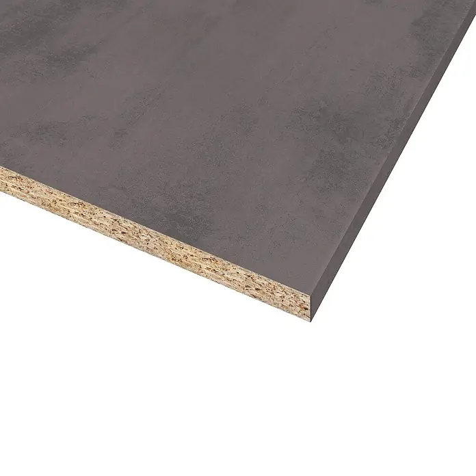 CUCINE Küchenarbeitsplatte nach MaßOnyx anthrazit, Max. Zuschnittsmaß: 410 cm, Breite: 63,5 cm, Stärke: 3,8 cm - Nahaufnahme einer Spanplatte mit grauer Beschichtung, die die Textur und Zusammensetzung des Materials zeigt.