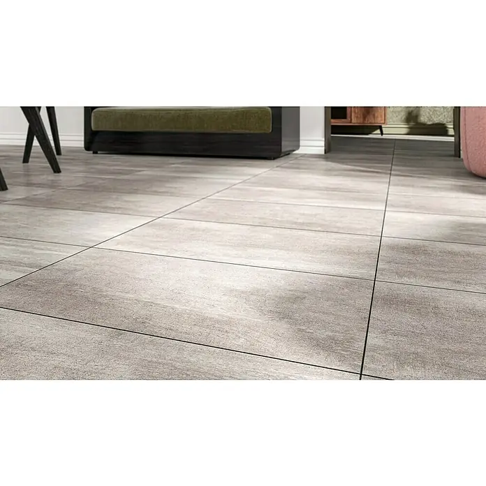 Steingutfliese Wave - 30 x 60 cm, Grau, Matt - Nahaufnahme von quadratischen Bodenfliesen mit hellgrauem Farbton und feinen dunklen Fugenlinien, die ein modernes und elegantes Design zeigen.