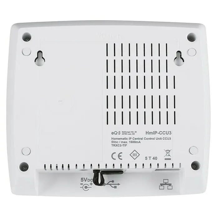 Homematic IP Centro de control CCU3 - Blanco, L x An x Al: 35 x 119 x 136 mm - Parte posterior de la unidad de control central Homematic IP CCU3 con puertos y puntos de montaje para una fácil instalación.