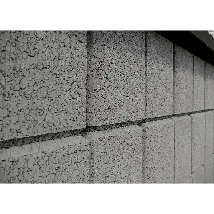 Christoph Gartenmauer Ambienta - 40 x 20 x 20 cm, Grau, Beton - Nahaufnahme einer grauen Betonblockwand mit sichtbarer Textur und Fugen, ideal für moderne Architektur- oder Bauprojekte.