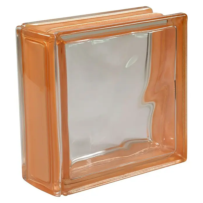Fuchs Design Glasbausteinprofil - Orange, 18 x 8 cm, Glas - Nahaufnahme eines orangefarbenen Glasbausteins mit klarem Innenraum, der eine moderne und dekorative Bauweise zeigt.